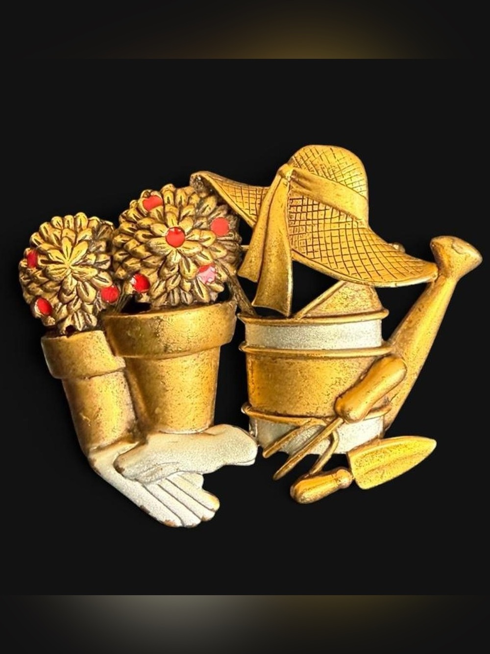 Vintage Danecraft Brass gardening pin with watering can, trowel, and flowers